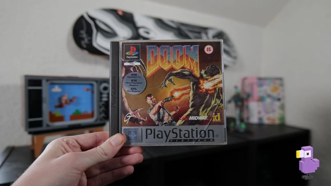 Doom PS1 game case in Rob's hand