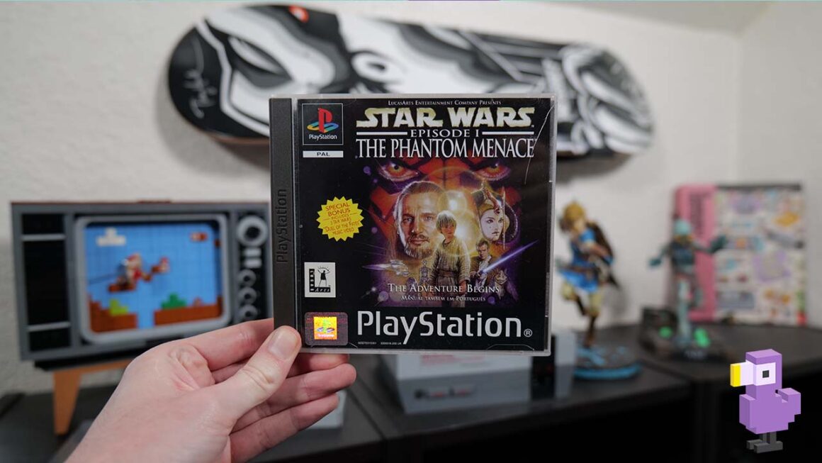 Rob holding his copy of Star Wars Episode 1: The Phantom Menace  for the PS1
