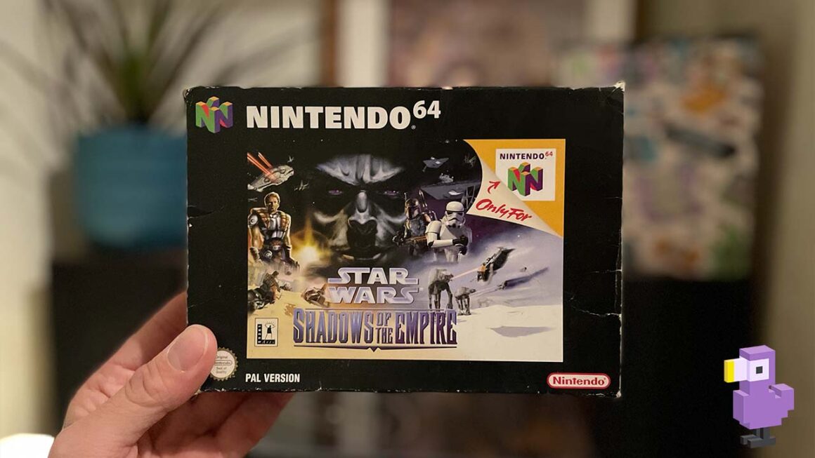 Star Wars Shadows Of The Empire N64 game box held by Seb