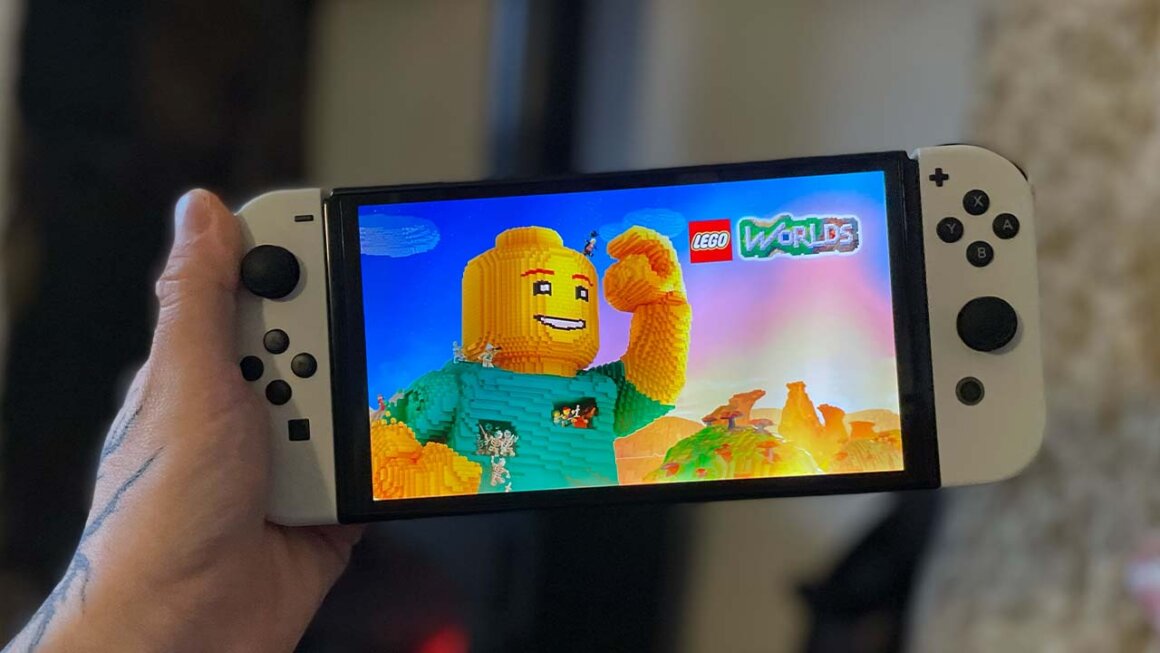 LEGO Worlds on Seb's Nintendo Switch OLED with white Joycons