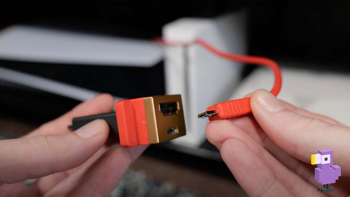 plugging a red usb cable into the mclassic hdmi upscaler