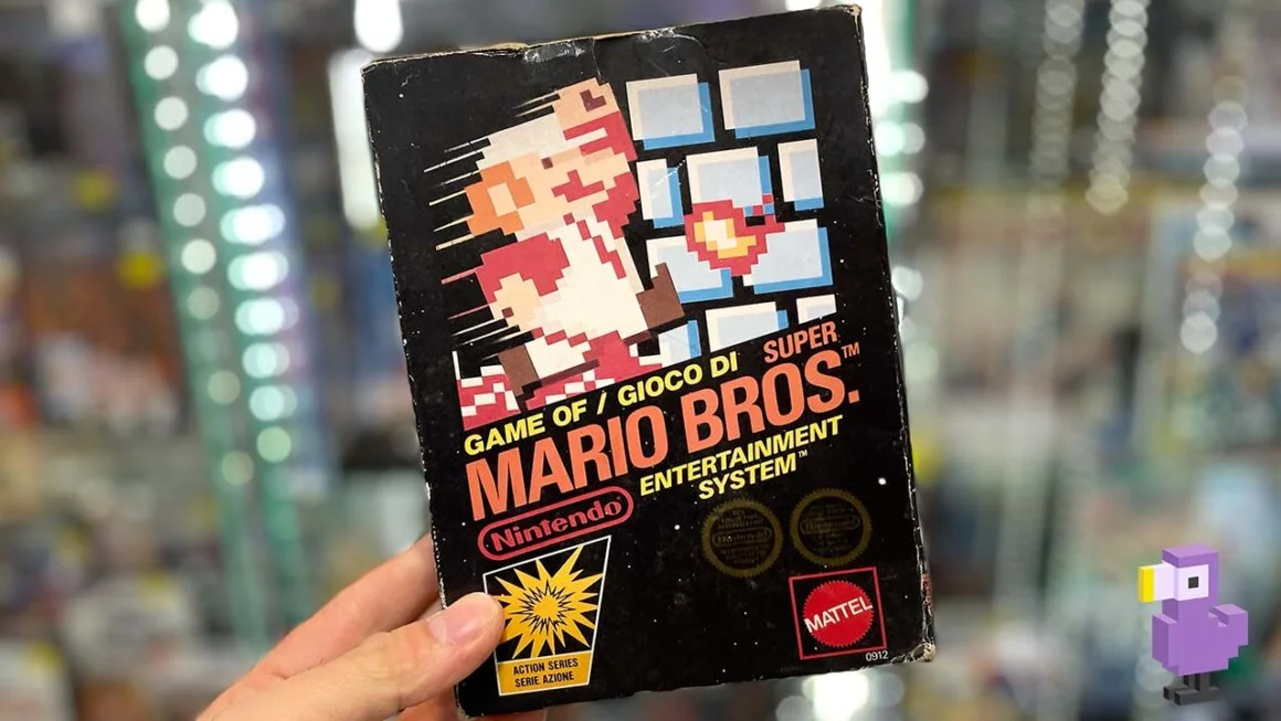 Super Mario Bros game case for the NES held by Seb
