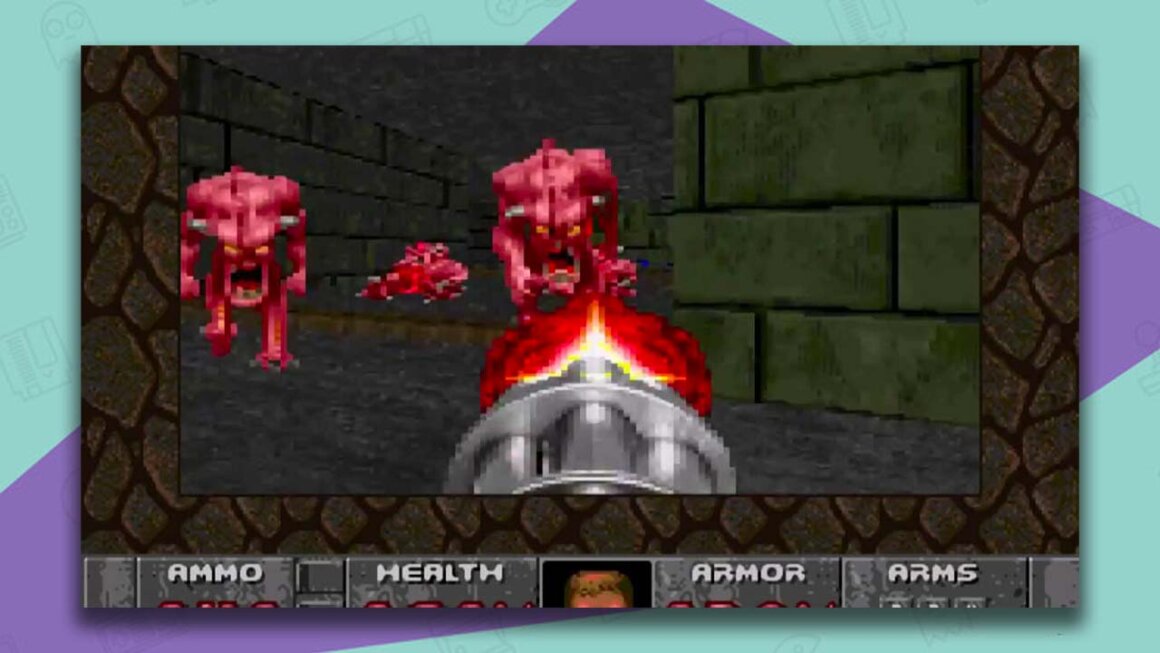 Doom gameplay showing a gun pointing at three red demons