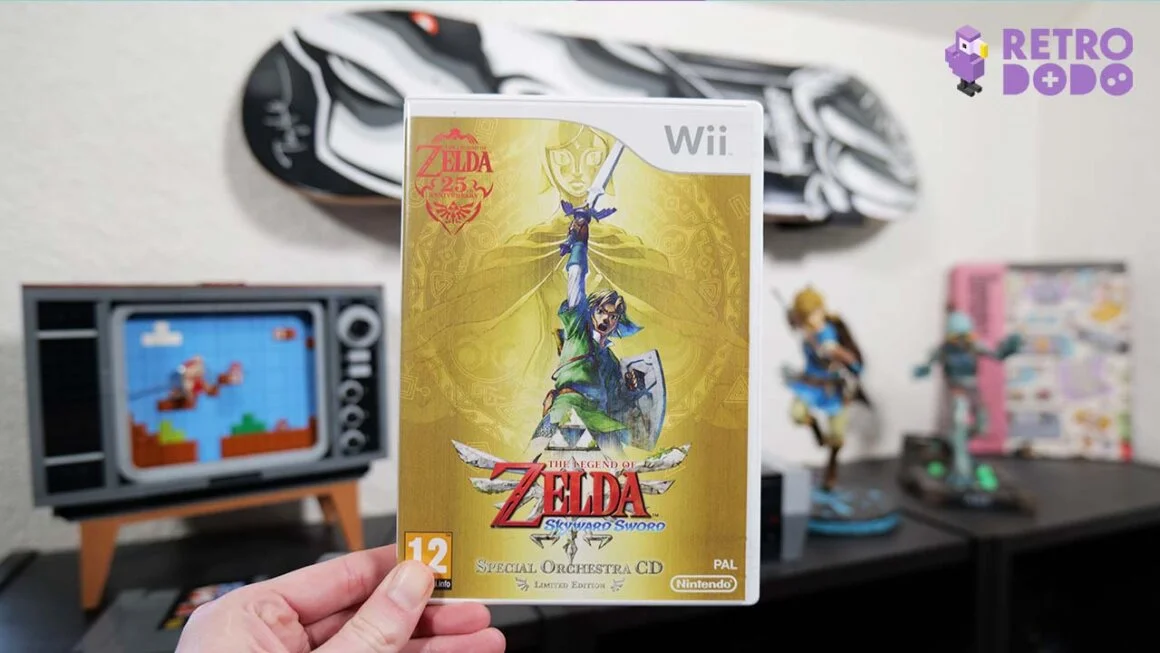 The Legend of Zelda: Skyward Sword (2011) for the Wii held by Rob