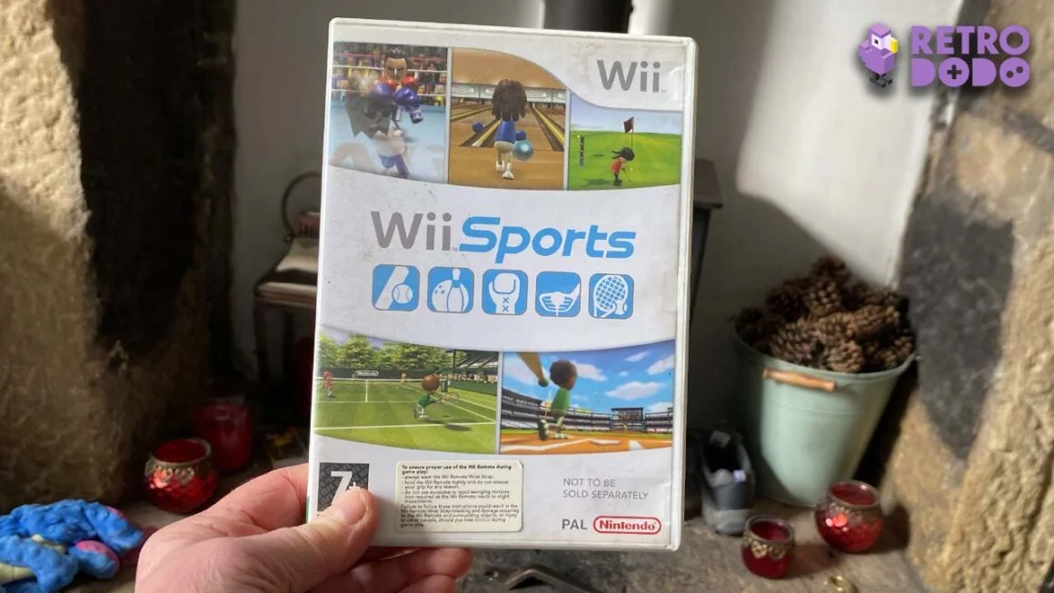 Wii Sports Wii Game case held in front of a fireplace