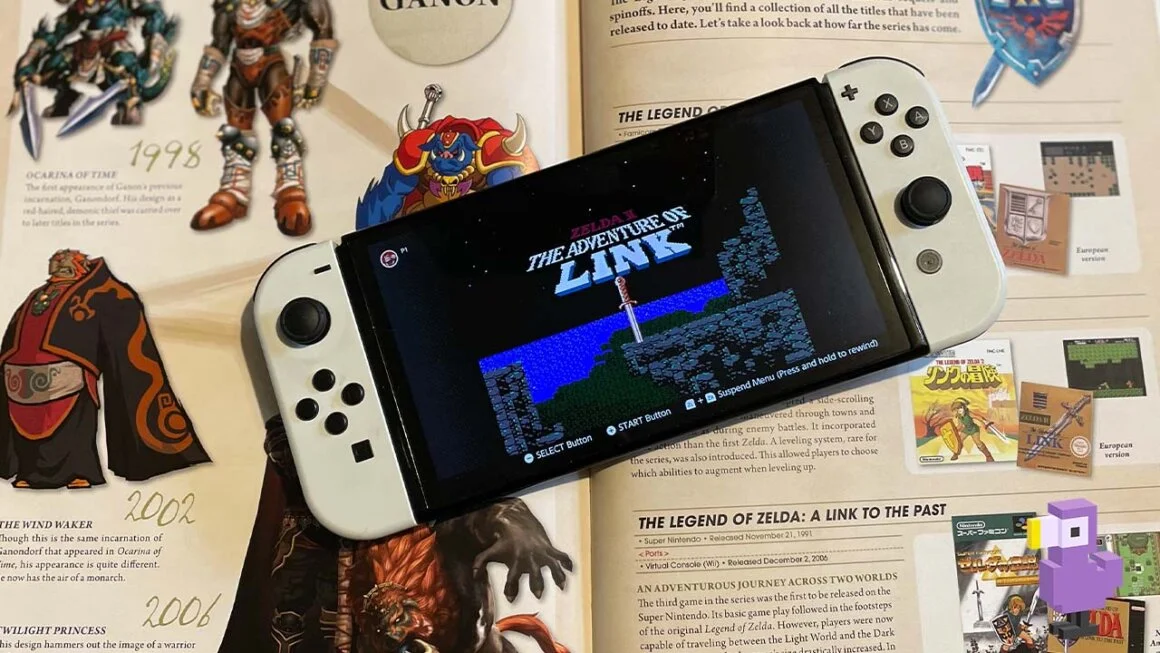 The Adventure of Link on the Nintendo Switch Online platfrom resting on a copy of Hyrule Historia