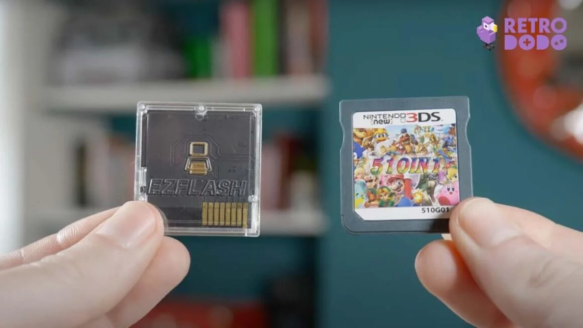 Rob holding the flash cart up next to a 3DS cartridge to show size comparison. They are both the same size