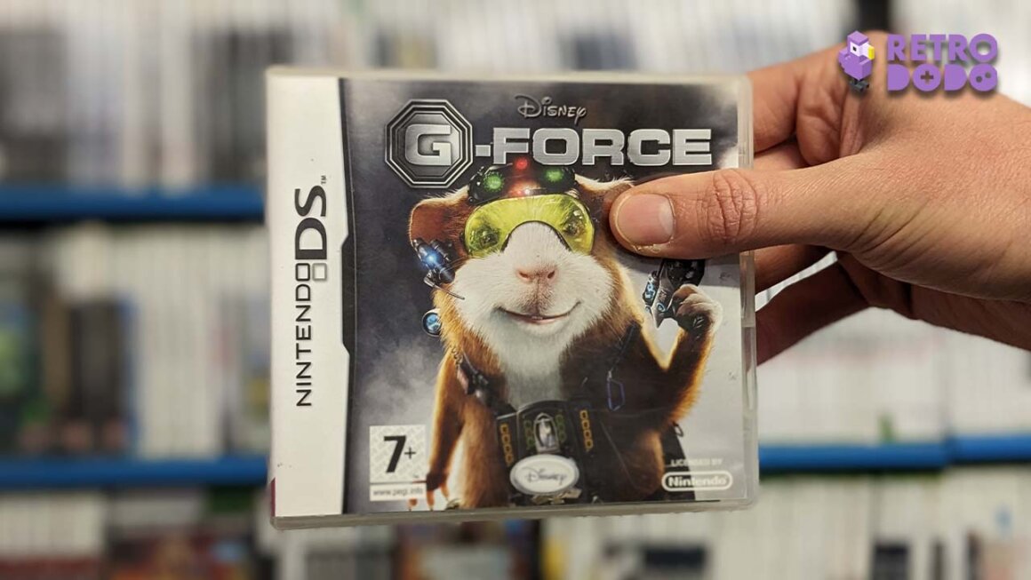 Nintendo DS box art for G-Force held by Theo