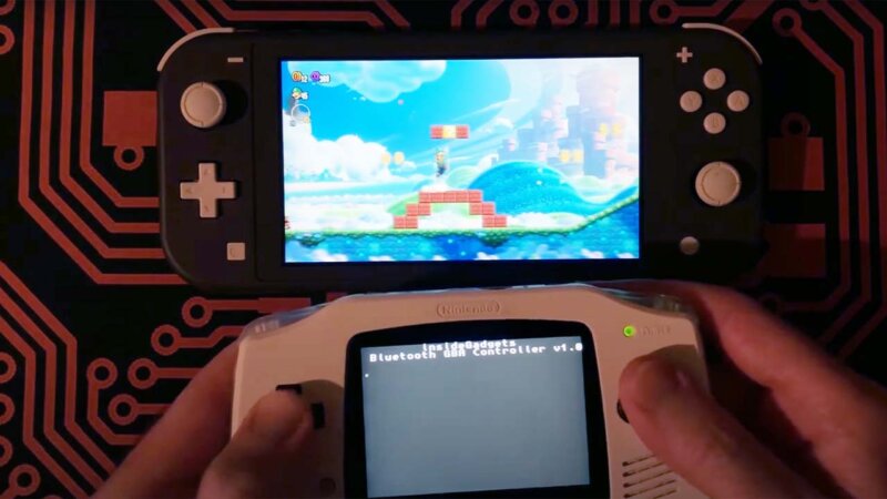 An image of a Nintendo Switch lite being controlled by a GBA