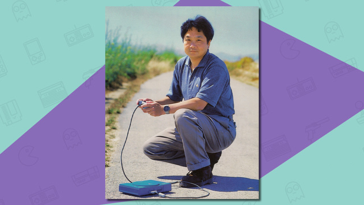 Ken Kutaragi photographed outside with the blue debug PlayStation.