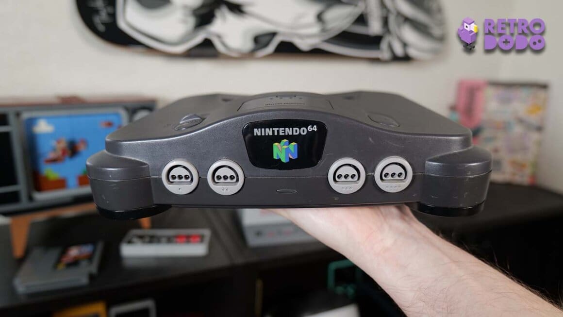 N64 Buyers guide image showing Rob holding an N64