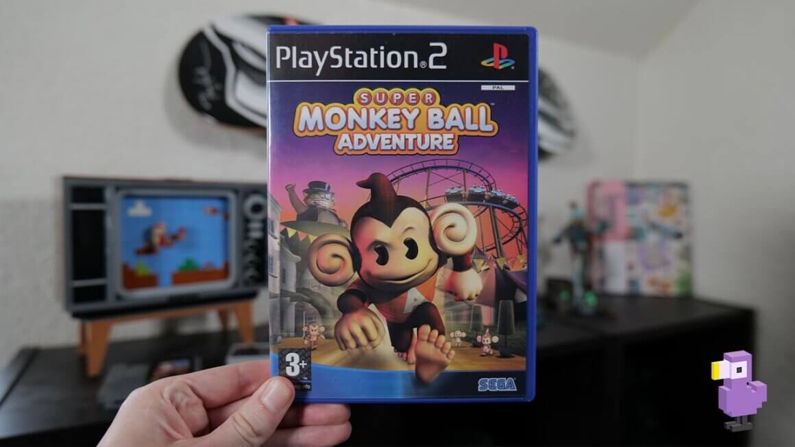 Rob holding his copy of Super Monkey Ball Adventure