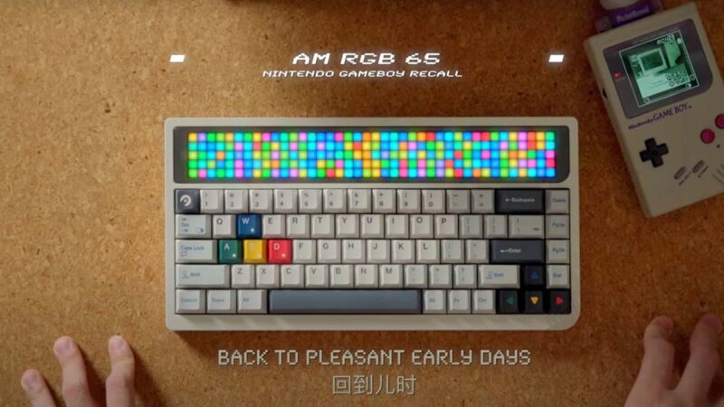 Am RGB 65 keyboard image from Angry Miao with a Game Boy next to it