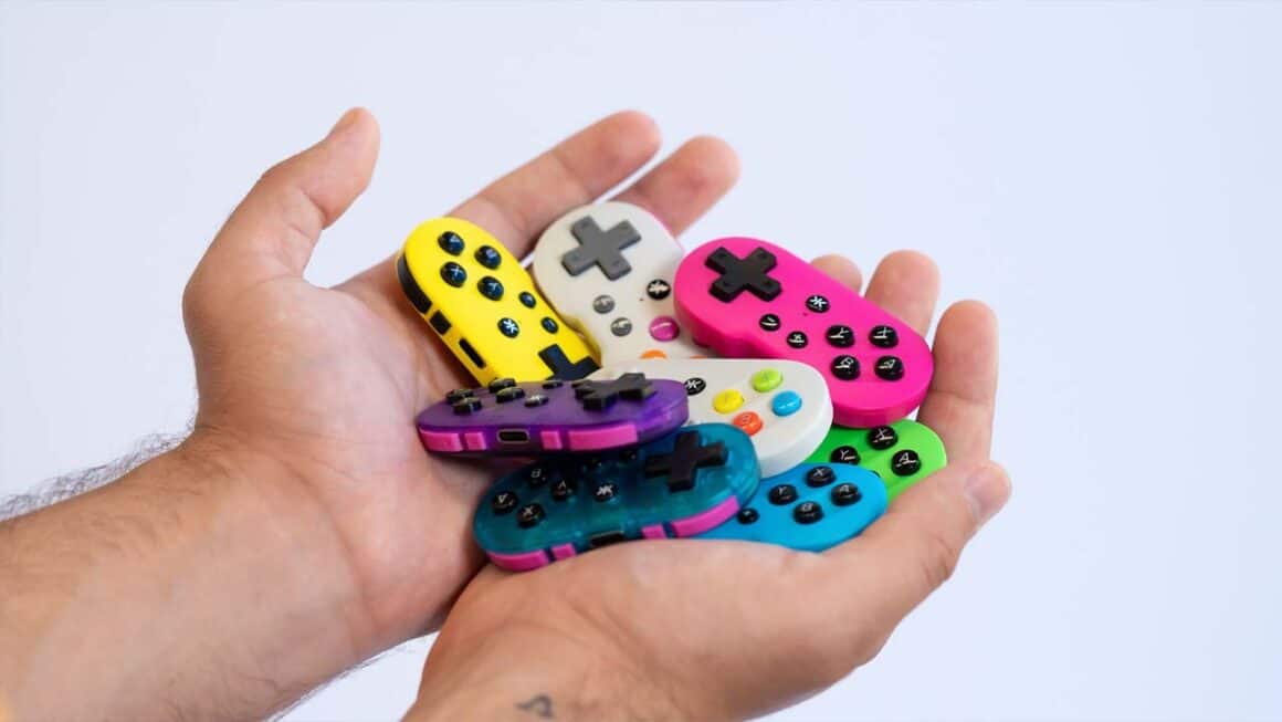 ATOM controllers in a person's hands