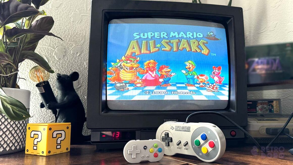 CRKD ATOM with a SNES controller and Super Mario All-Stars