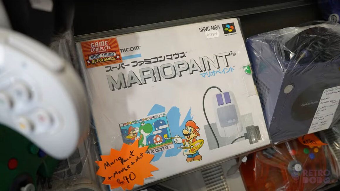 A boxed Japanese Mario Paint bundle next to a GameCube