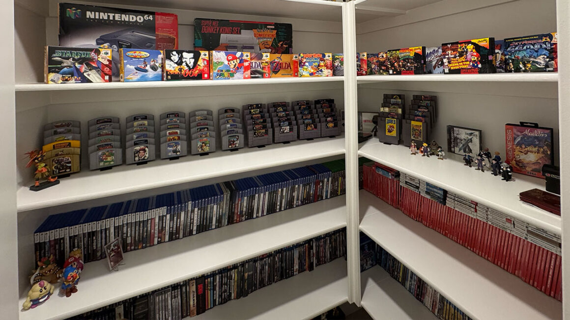 Devin's boxed game collection as well as game cartridges and figurines